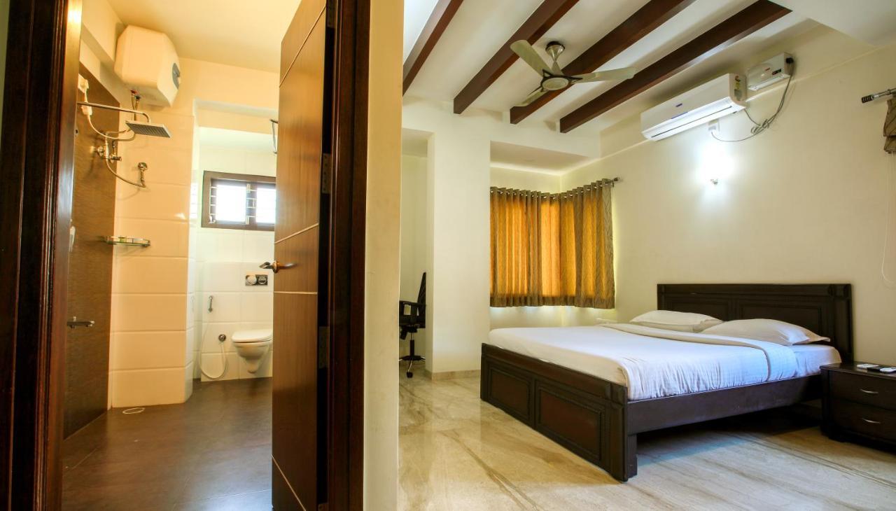 Falcon Suites Yelahanka New Town Бангалор Экстерьер фото