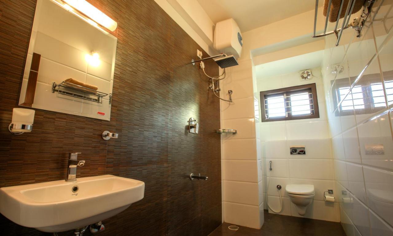 Falcon Suites Yelahanka New Town Бангалор Экстерьер фото